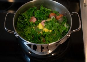 A pot with the kale soup base