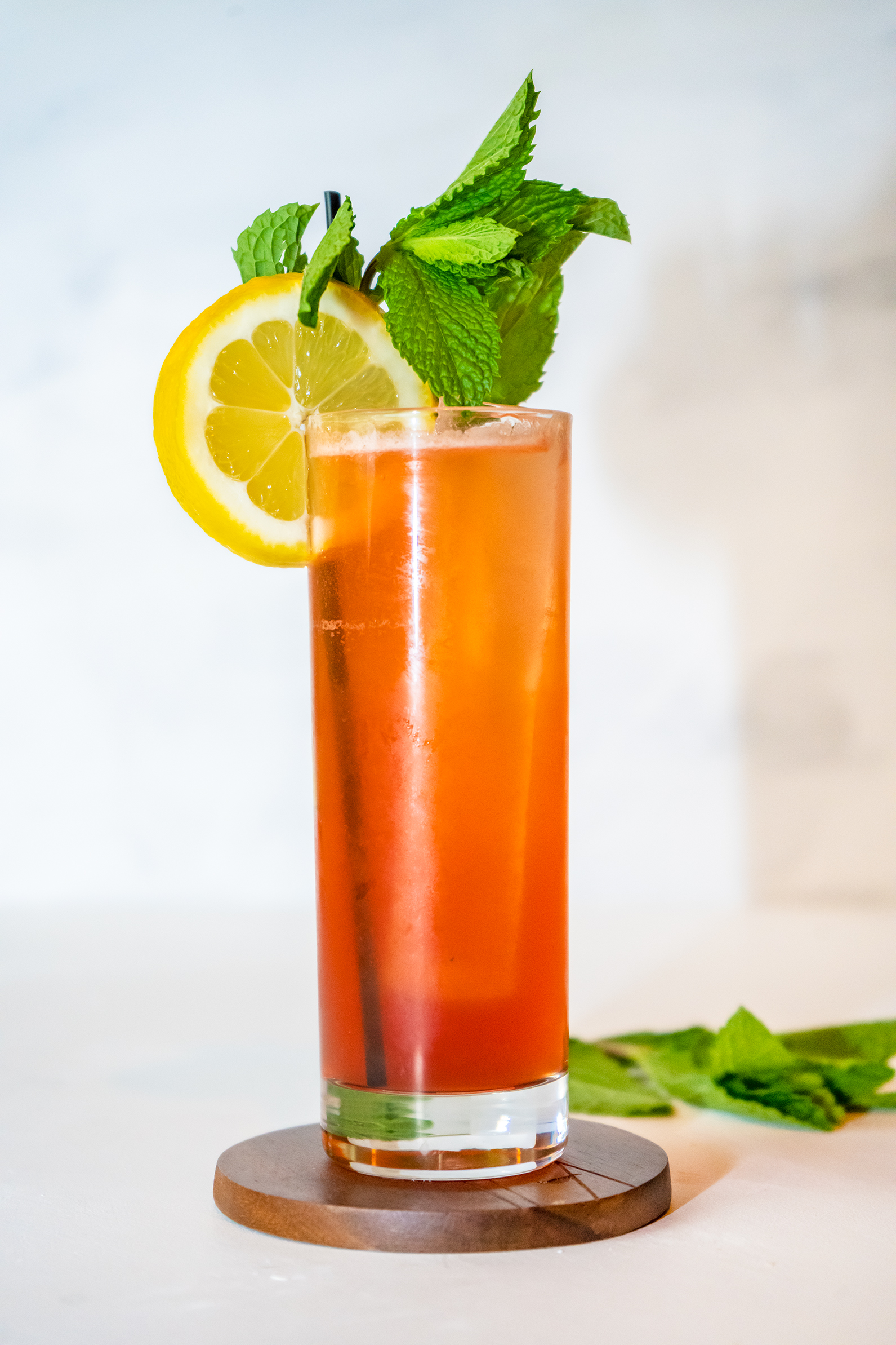 Amber Road Cocktail with mint garnish