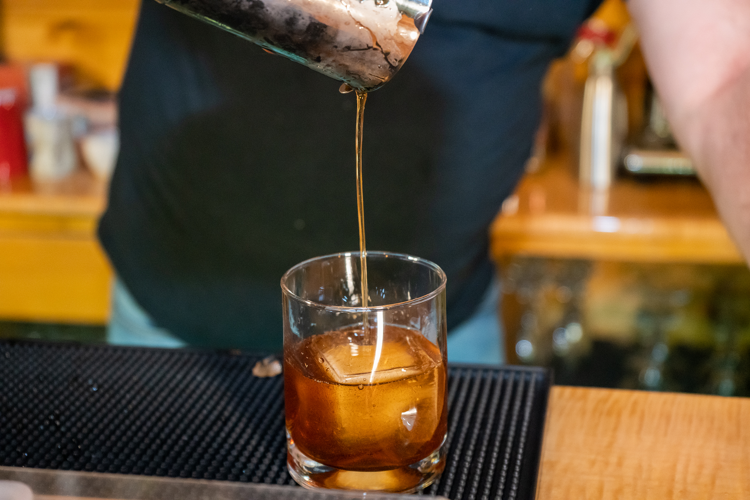 Straining Black Russian Cocktail